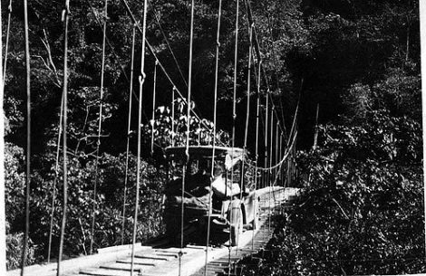“Automobile crossing rope bridge. 1923.” Photograph made accessible by the Field Museum Library. http://www.flickr.com/photos/field_museum_library/4462494439/
